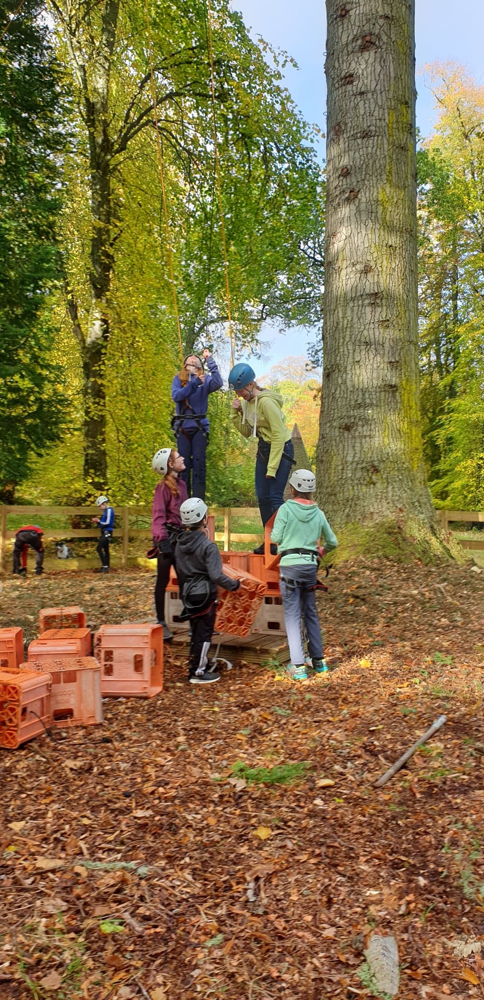 A group of children enjoying crate stacking activity at Fairburn.